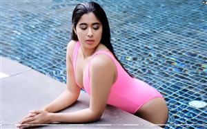 Nikita Sharma sizzles in this hot pink monokini